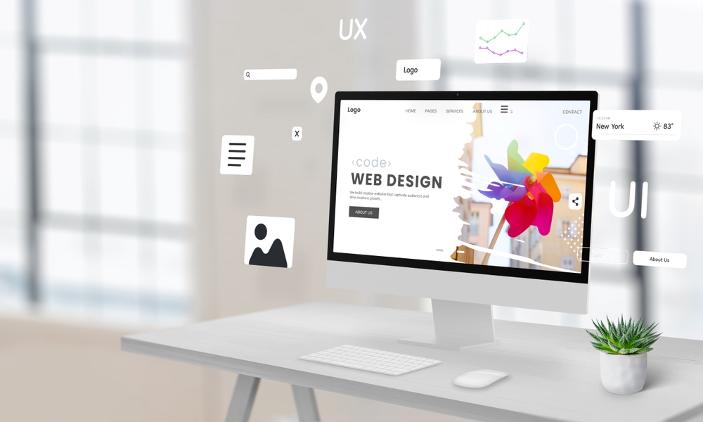 Person working on website design at their desk